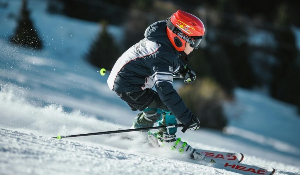 Man Skiing on snow-covered slopes